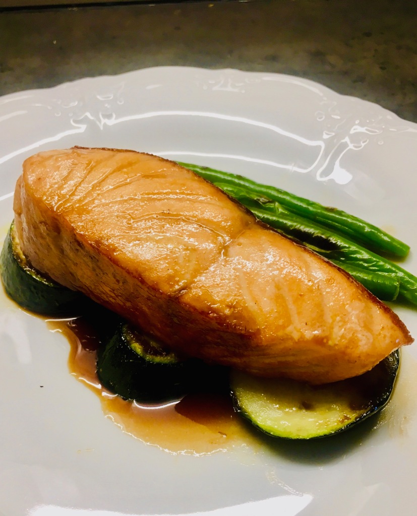 Teriyaki Salmon served with pan-fried zucchini and green beans